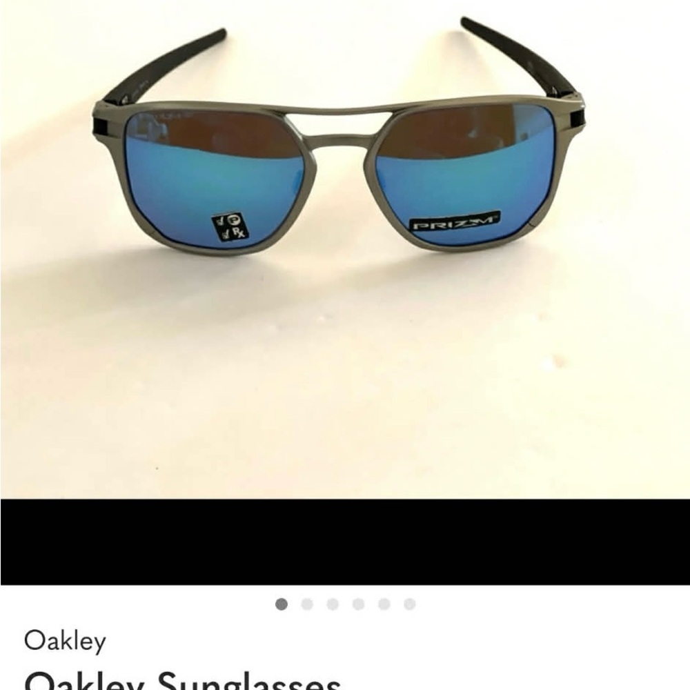 Oakley Sunglasses with Blue Mirror Lenses and Gray Frame